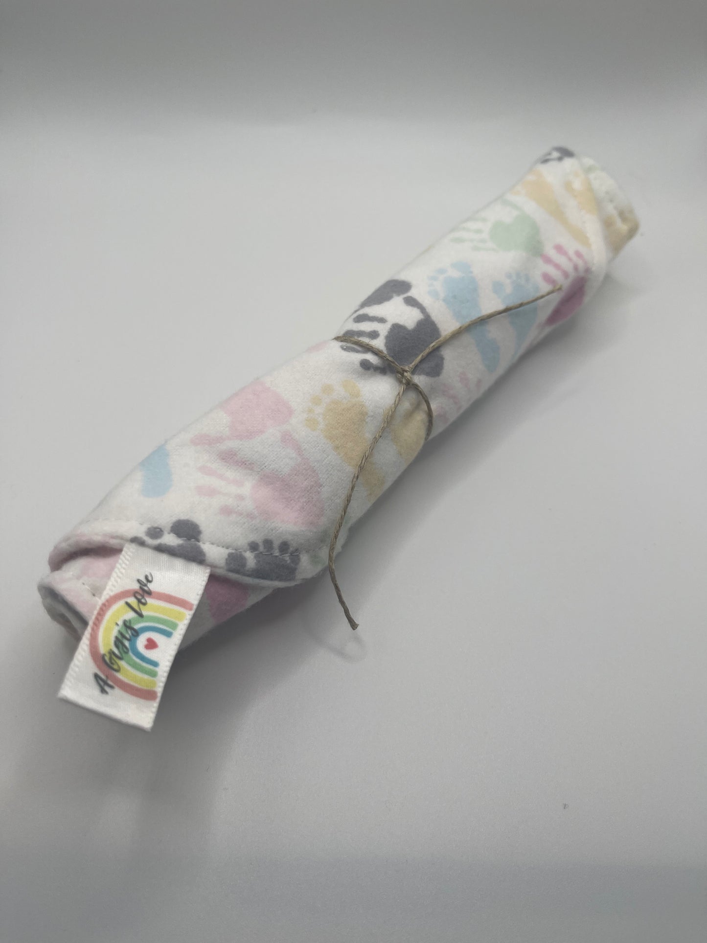 Pastel baby handprints burp cloth